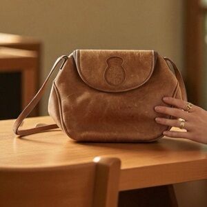 Vintage 80s Unisa Brazil Leather Saddle Shoulder Bag
Emblem Crest Logo